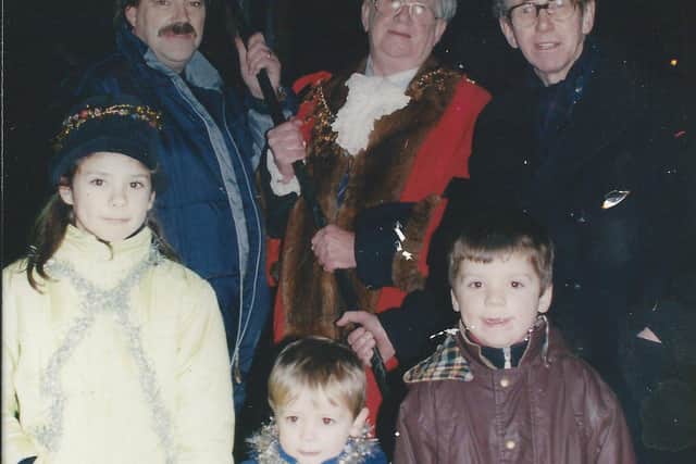 Lucy Young (7), George Young (5) and Charlie Young (2) helped the mayor to light the Millenium Beacon in Park Avenue, Louth.