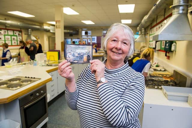 Louth Academy. Grandparents Day. Former teacher Barbara Chester with a photo from the 1980s showing her teaching in the same room. (Picture: Sean Spencer/Hull News & Pictures Ltd)