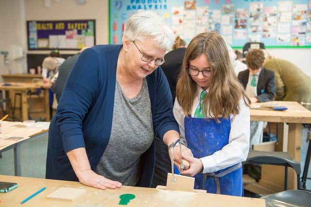 Somercotes Academy. Grandparents Day. Emily Richardson and grandma Ann Webster woodworking. (Picture: Sean Spencer/Hull News & Pictures Ltd)