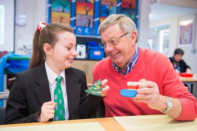 Somercotes Academy. Grandparents Day. Mia Stubbs and grandad Alan Brothwell making Xmas decorations. (Picture: Sean Spencer/Hull News & Pictures Ltd)