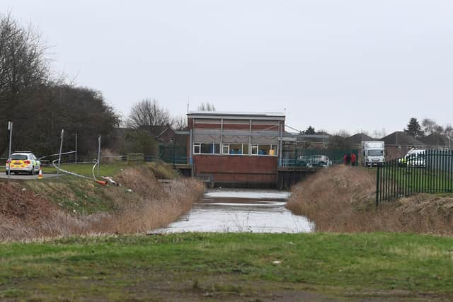 Police presence at the pumping station where the body was found