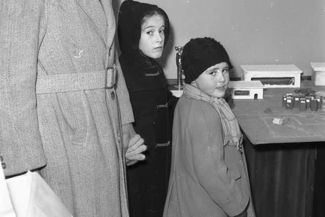 Morris Cook, with his children John and Jane.