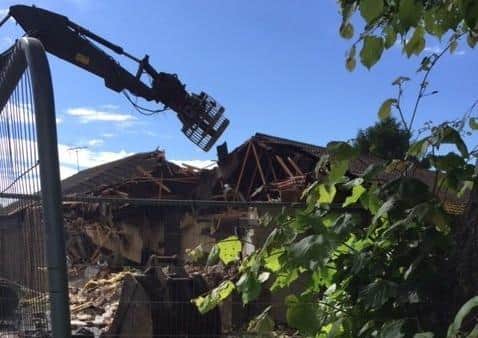 The old Nocton Village Hall and Social Club being demolished. EMN-200117-165129001