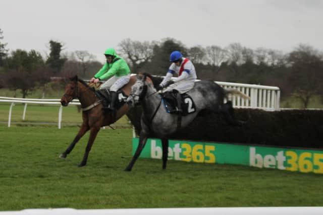 Zolfo (right) continued his winning run in the Wetherby’s Bank Handicap Steeplechase. Picture: Peter Thompson EMN-200120-094227002