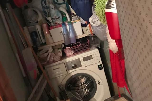 BEFORE: The laundry cupboard before the tidy.