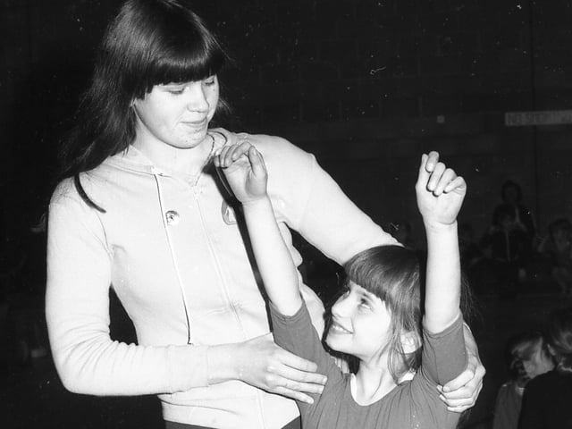 Tanya Huggins (right) is given some help by Tracey Goodliffe.