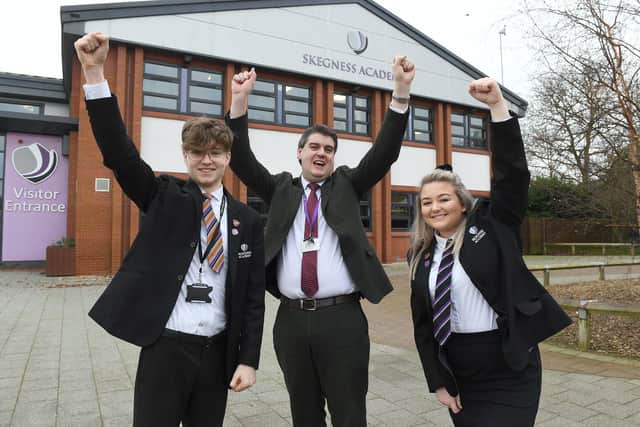 Skegness Academy principal Todd Johnson celebrating with head boy Matthew Mitchell and head girl Jade Harrison, ANL-200302-124317001