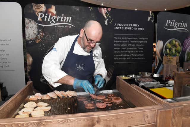 Expo Trade Show at Richmond Holiday Centre, Skegness. Head Development Chef for Pilgrim Food Services, Mike House cooking Vegan burgers. ANL-200602-104029001