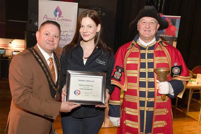 Expo Trade Show at Richmond Holiday Centre, Skegness. Winning Food exhibitor, Pilgrim Food Service. Rachel Hothersall with Mayor of Skegness Mark Dannatt and Skegness Town Crier Steve O'Dare. ANL-200602-103954001