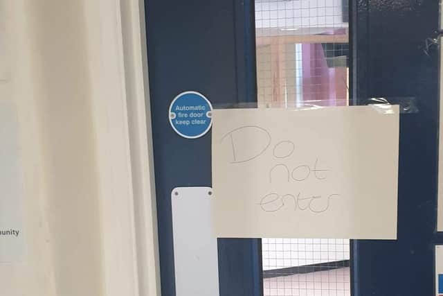 A 'Do Not Enter' sign has been put on a door at the hospital.