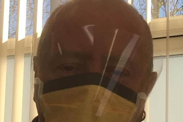 Peter Rodwell wearing his mask.