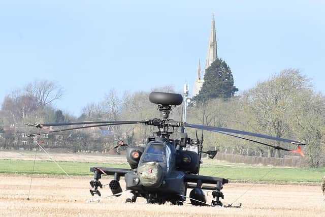 The stranded Apache in the field at Helpringham Fen on Monday morning. Photo: David Dawson