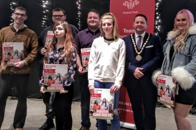 Duncan Doughty, Callum Allsop, Shona Aldin, Dominic Forman, Leanne Hodges and Kelly Missa pictured with the Mayor of Skegness Coun Mark Dannatt at the presentation. . The seventh team member, Reece Ride,  who completed the course unfortunatelycouldn't attend the presentation.