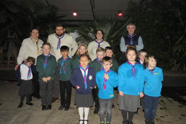 1st Wainfleet Scouts investiture at the Lincolnshire Wildlife Park. Also pictured are the adults who were invested - Adam Ongley, Emma Harness and Austen Ellis - and Sarah Baumber District Commissioner Skegness and Spilsby .