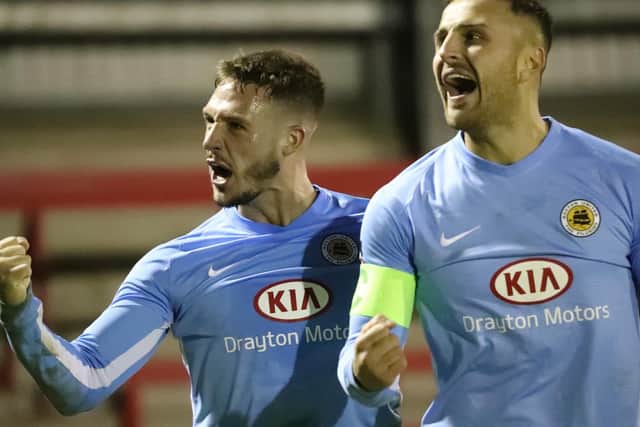 Abbott celebrates with Luke Shiels. Photo: Eric Brown