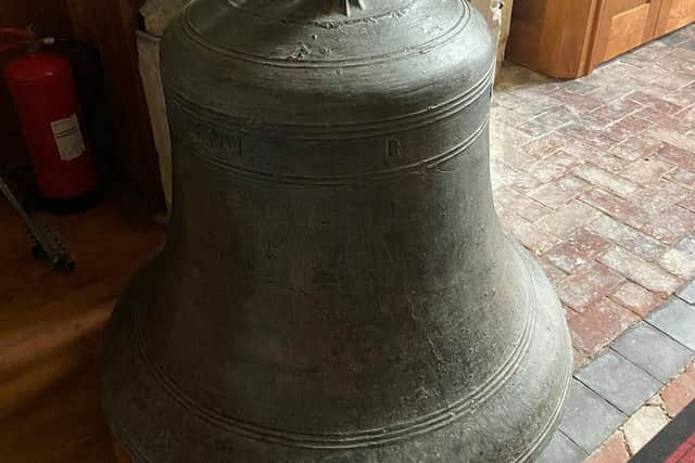 The medieval bell on display in St Helen's Church, Stickford.