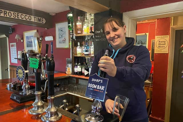 Landladyof the Red Lion Katie Buncombe is welcoming punters back to the pub.