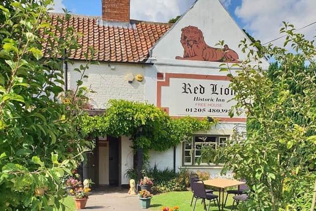 The Red Lion blooms in the summer with its attractive garden and music events.