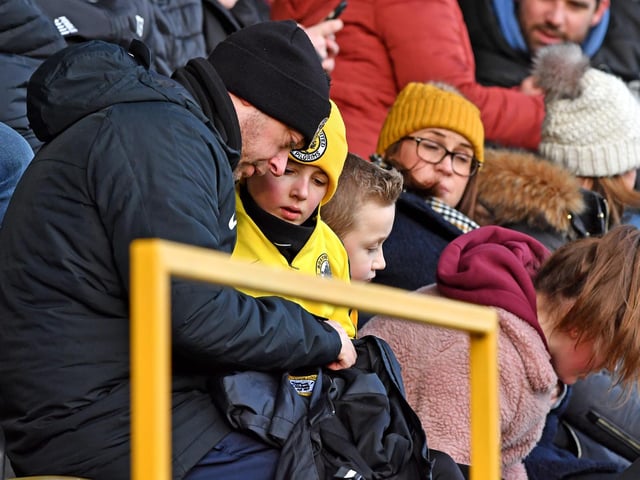 Fans watch Boston United v Telford. Photo: John Aron