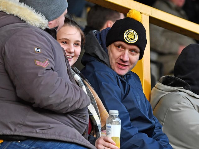 Fans watch Boston United v Telford. Photo: John Aron