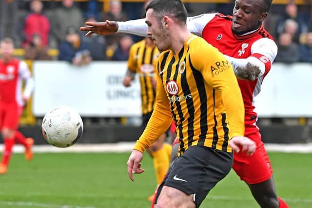 Mulhern on the ball against Kidderminster Harriers. Photo: John Aron.