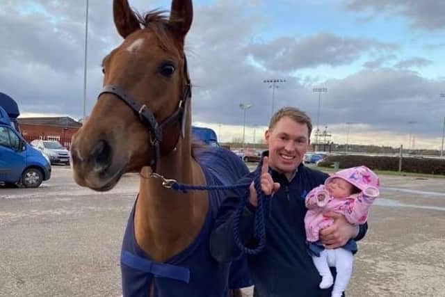 Olly Williams and baby daughter at Southwell EMN-200227-130419002