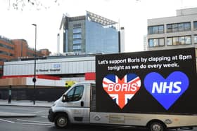 A billboard van outside St Thomas' Hospital in Central London where Prime Minister Boris Johnson is undergoing treatment. Photo: PA