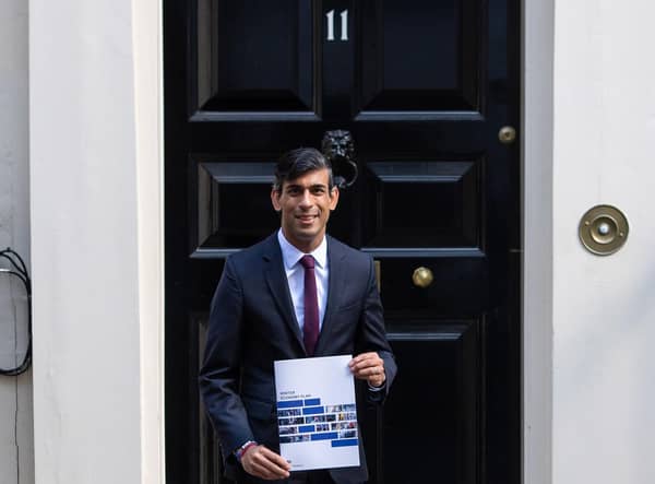 Chancellor of the Exchequer Rishi Sunak holds a copy of his Winter Economy Plan outside No 11 Downing Street before heading for the House of Commons to give MPs details of his Winter Economy Plan. Photo: PA