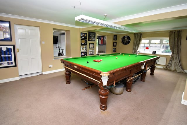 A large facility that could suit many purposes but is currently used as a games room.