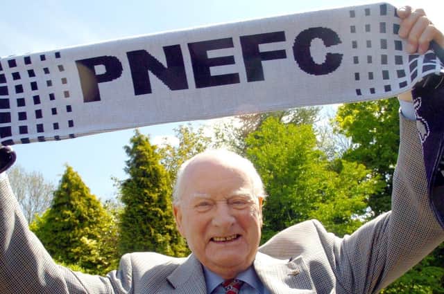 Sir Tom Finney holds aloft a PNE scarf ahead of the 2005 play-offs