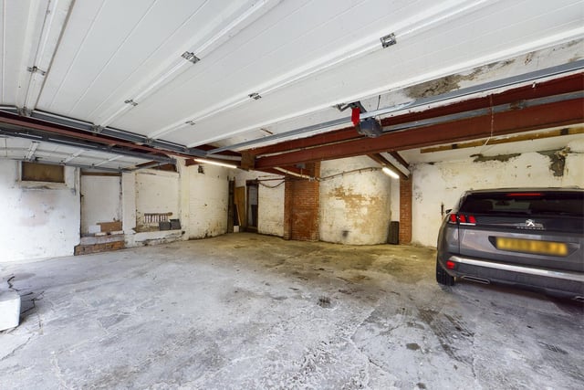 Triple garage can accommodate 4 to 6 cars.