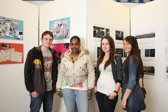 Calderdale College graphic design students with their exhibition back in 2009.