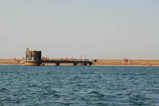 People were pictured around the edge of Covenham Reservoir earlier this week. (Photo: Paul Rickett/Facebook)