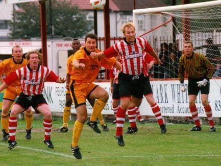 Greg Fee in action against Altrincham. Photo: Ken Fox