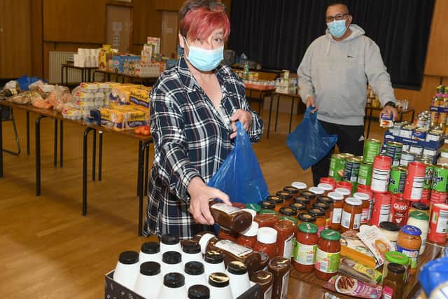 Heckington Community Larder in Heckington Village Hall. Sue Tucker and Leroy Tucker. EMN-200627-174355001