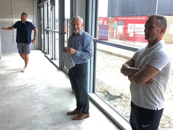 Manager Elliott withy chairman David Newton and assistant John McDermott on site. Photo: Boston United