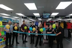 Staff at Poundland celebrating the opening of their new store in Ingoldmmells.