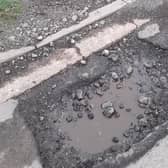One of the potholes on The Causeway in Burgh le Marsh which is causing concern.