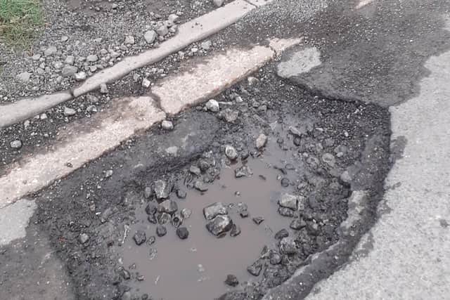 One of the potholes on The Causeway in Burgh le Marsh which is causing concern.