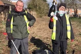 Just before lock down, volunteers did a couple of litter picks along the lane next to the police station. Litter pickers Scotney and Randolph Murray are pictured with their grabbers and bags. EMN-200607-121230001