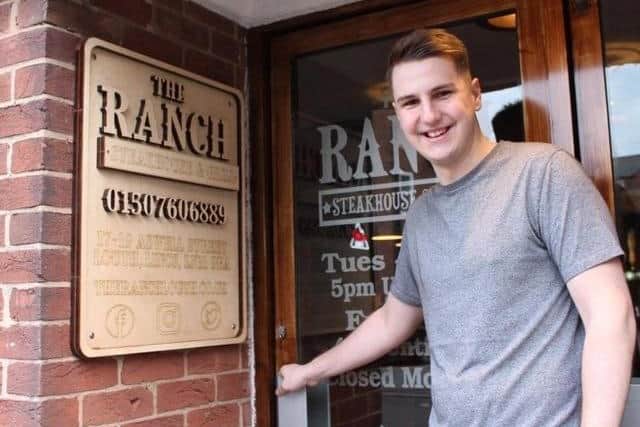 Oliver Crossland outside The Ranch Steakhouse & Grill.