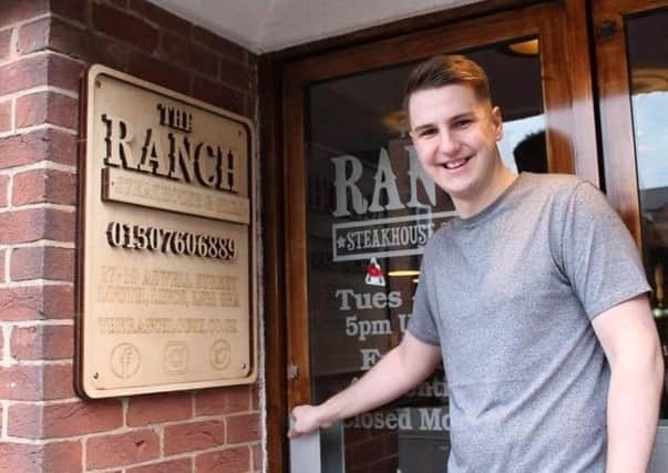 Oliver Crossland outside The Ranch Steakhouse & Grill.