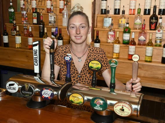 Gemma Richardson of the Castle Inn is ready for punters on July 4
