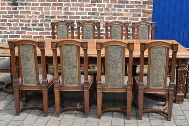 An early 20th century carved walnut dining table and chairs that went for £3,200, eight times pre-sale estimate.
