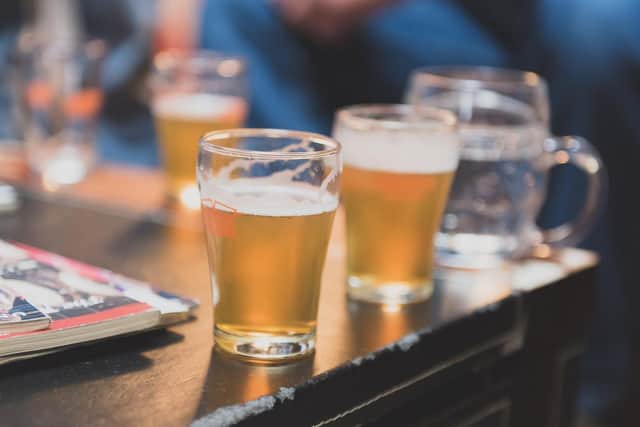 Glasses of beer on a table