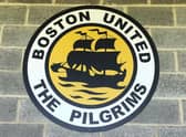 This club crest which hands on the Town End is among the lots.