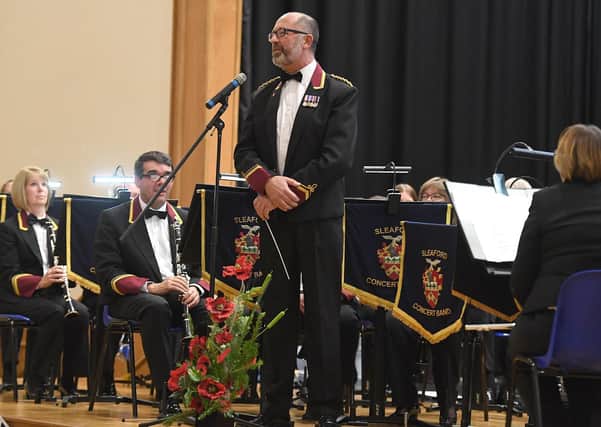 A previous year's Royal British Legion poppy prom with Sleaford Concert Band Director of Music Richard Joyce . EMN-200307-122652001
