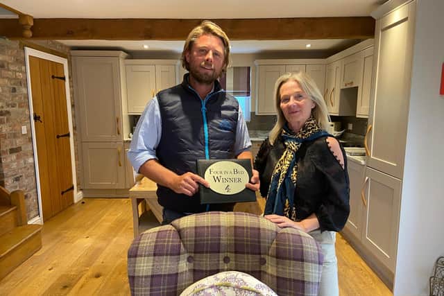 Karen and Liam Cumberlidge of Burgh le Marsh with their award for winning Channel 4's Four in a Bed for a stay in one of their cottages (pictured).
