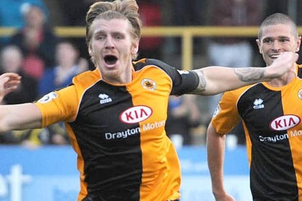 Carl Piergianni celebrates with Scott Garner.