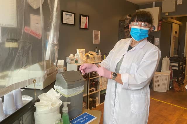 Amanda Flint, owner of Hairs and Graces, ready to greet customers.
